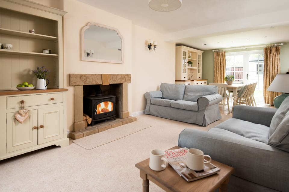 Large family room opening into kitchen/diner, perfect for entertaining groups 