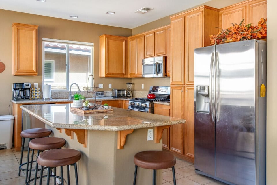 Fully stocked kitchen with modern appliances