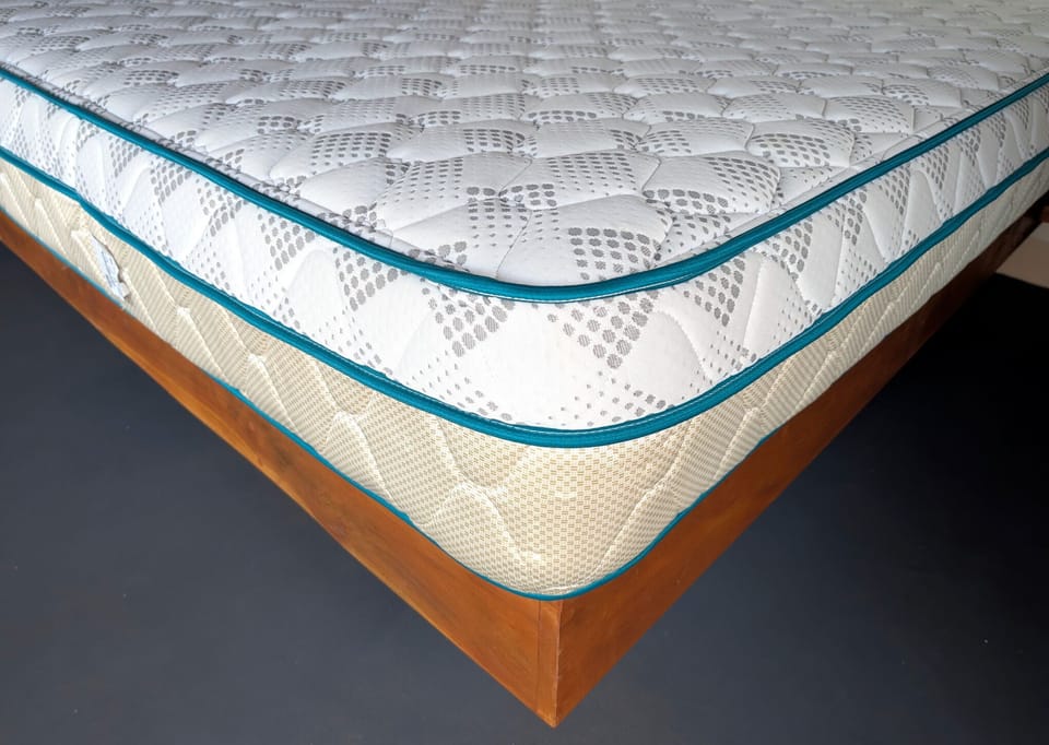 Soft, pillow-top mattress, then enclosed in 6-sided zippered protector.