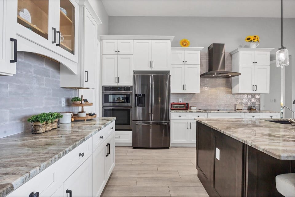 Beautiful, bright, open, fully equipped kitchen. Kitchen island seats 4