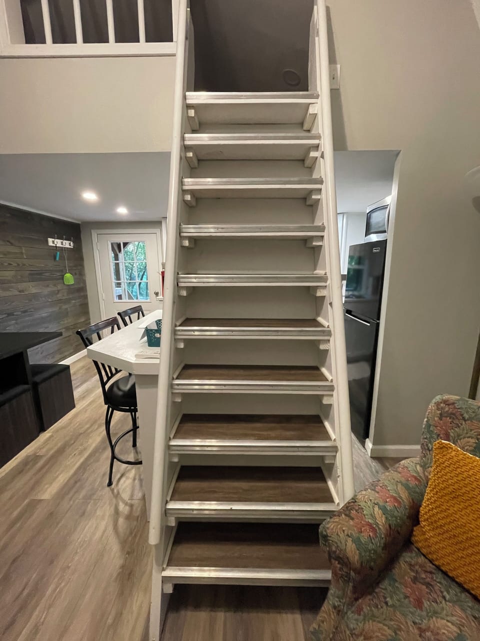 steps to access the loft above the kitchen