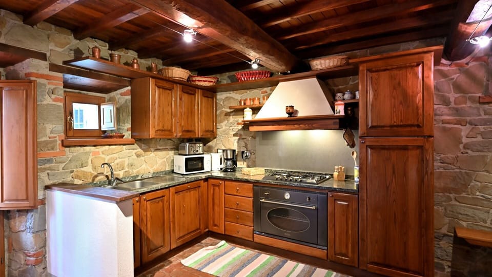 Countertop, Cabinetry, Property, Kitchen Appliance, Kitchen, Kitchen Stove, Wood, Drawer, Interior Design, Home Appliance