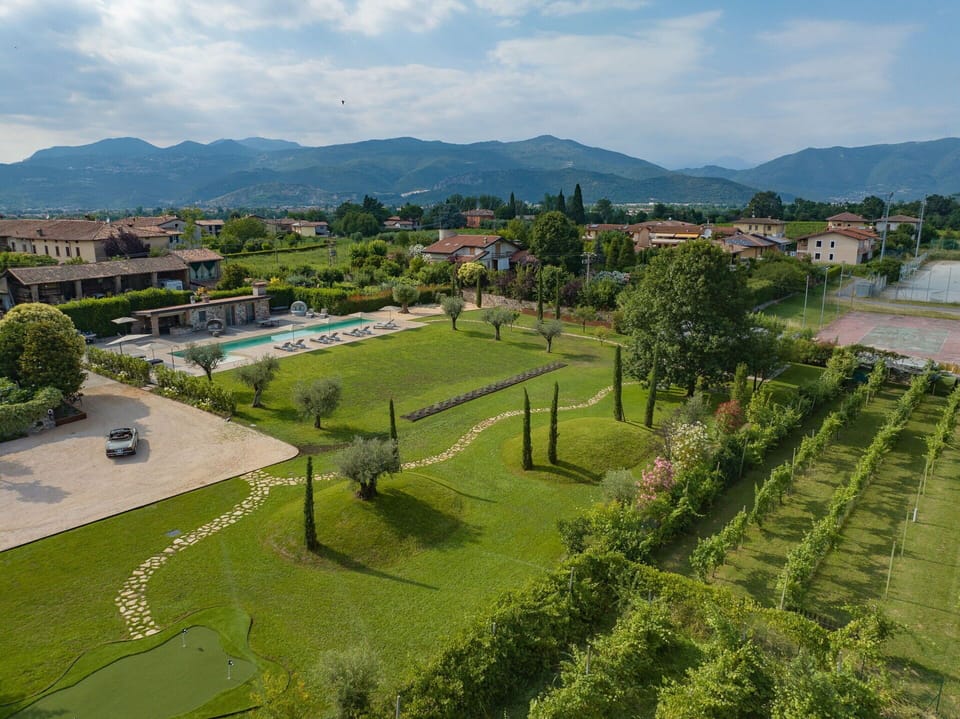 Activities, Amenities, Balcony / Terrace / Patio, Building Exterior, Golf, Pool, Spring, Summer, Wellness