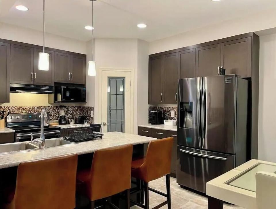 Large fully-equipped kitchen space.