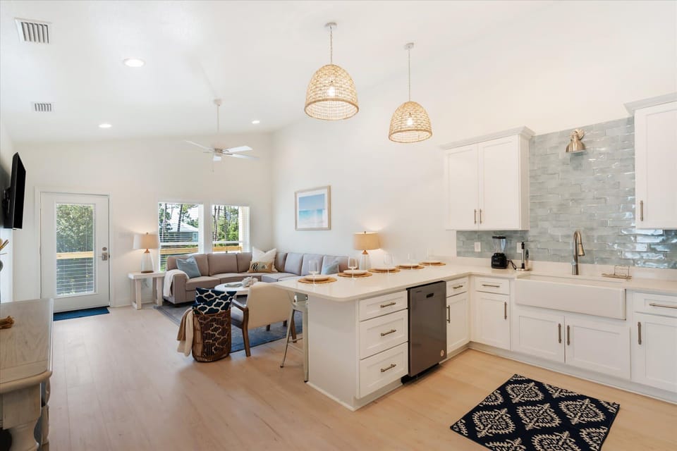 Spacious open-concept design seamlessly connecting the kitchen and living room!