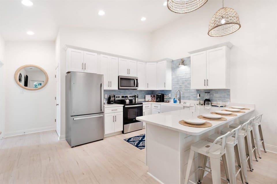 Five barstools provide ample seating for guests to gather, dine, and enjoy great company.