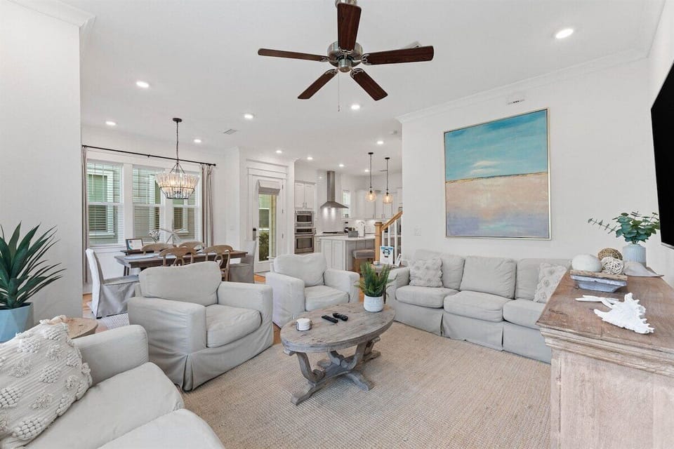 Cozy up in this modern coastal-inspired living room, where comfort meets effortless style.