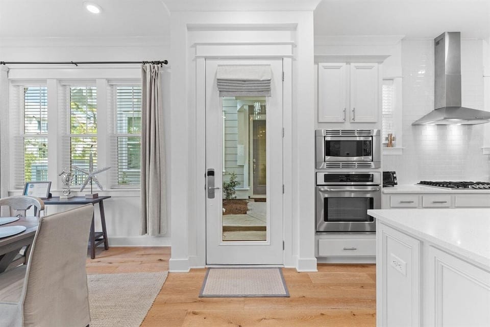 Step into a beautifully designed entryway that sets the tone for beachside elegance.