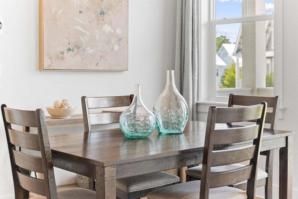 Beautiful decorative accents enhance the dining experience in this stylish vacation home.