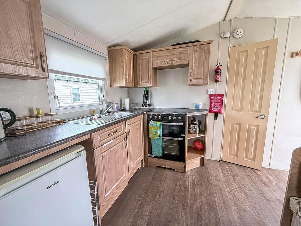 The well designed kitchen in your caravan is designed to make self-catering a pleasure during your seaside family holidays.