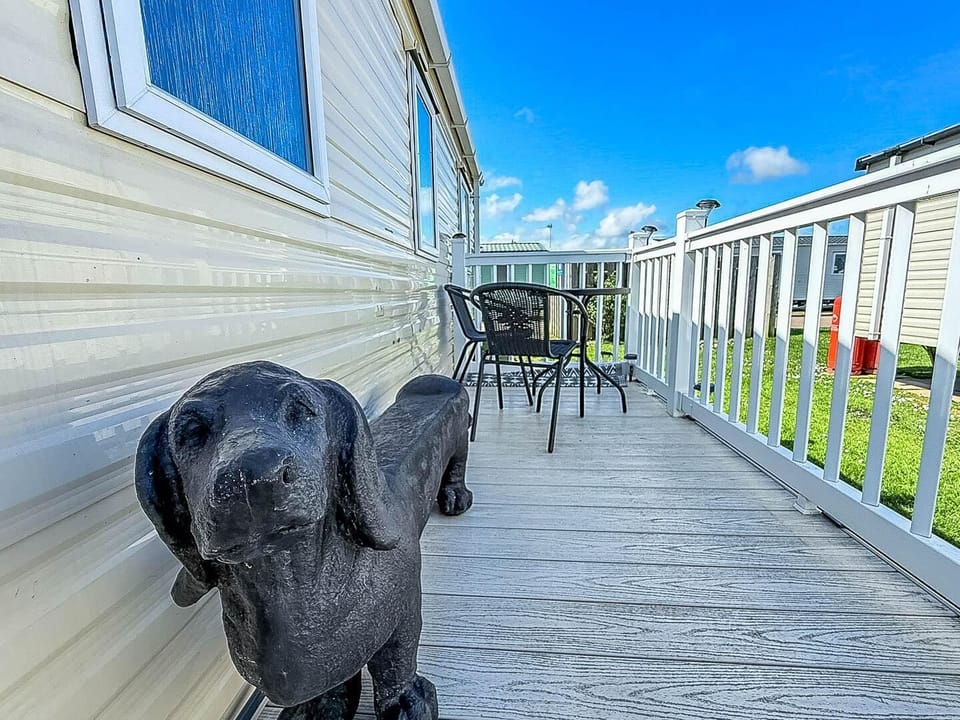Step outside your caravan and onto your private decking area, the perfect spot to soak up the fresh seaside air.