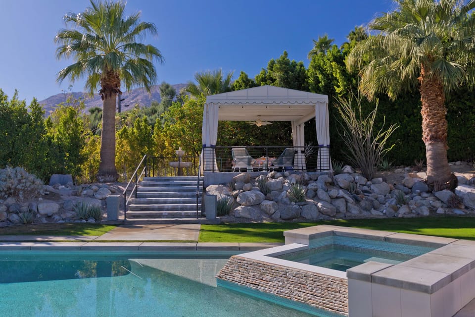 Elevated pergola for entertaining overlooking the pool 