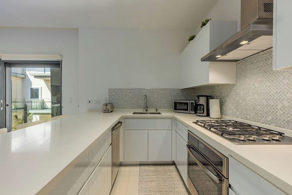 Our full Kitchen equipped with modern amenities invites you to unleash your inner Chef. Cook, create, and indulge in delicious creations.