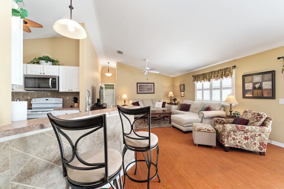 Open layout features a shared dining, kitchen & living room