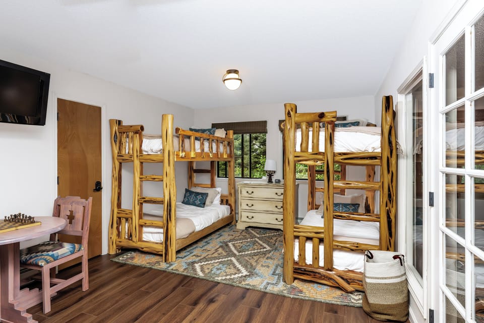 Two twin over twin bunk beds on the third floor. 