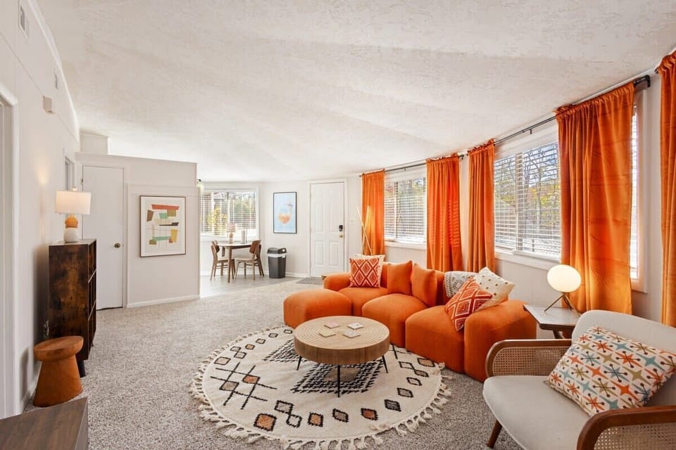 Step into the decagon 1970s vibe with two bedrooms to the left with a kitchen straight ahead.