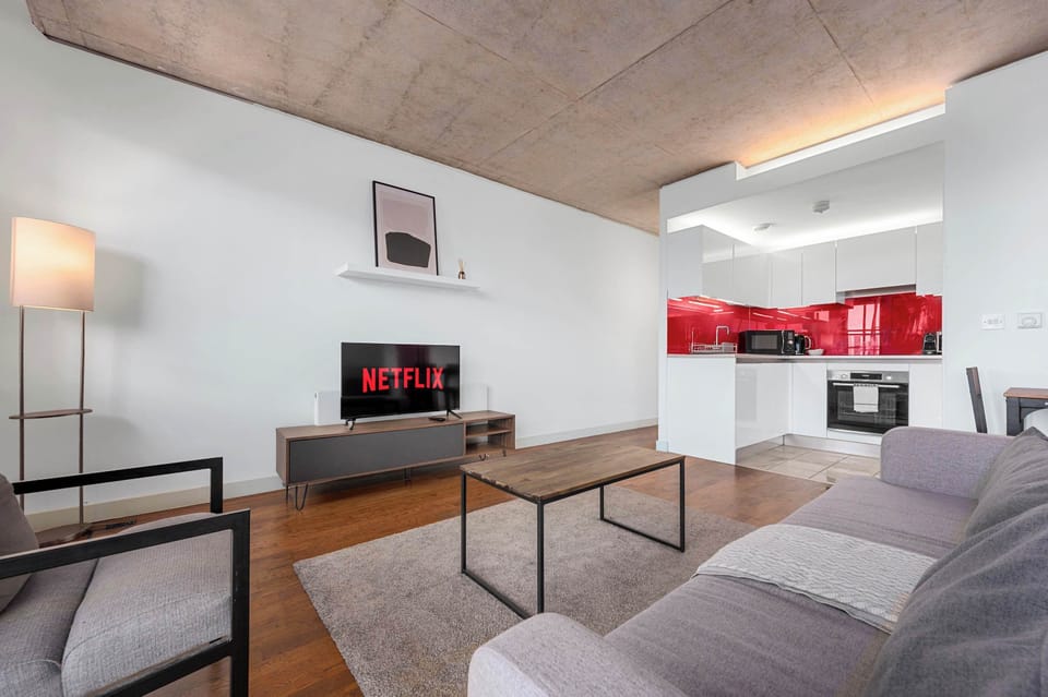 Kick back on the sofa and enjoy the spacious living area after a day exploring the city