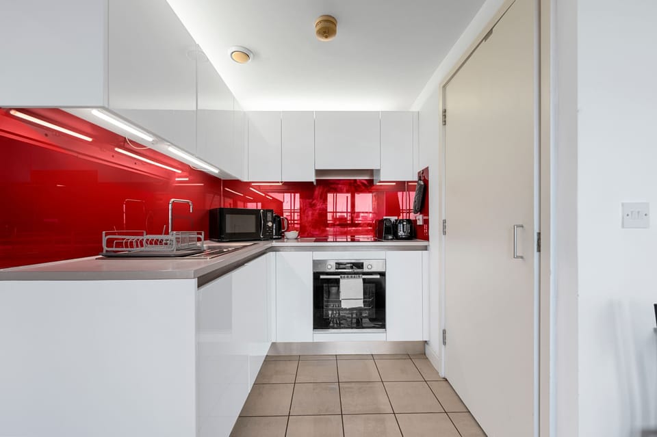 Bold, modern kitchen with everything you need to whip up a meal or grab a quick coffee before heading out