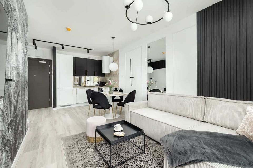 Enjoy your favorite shows on the flat-screen television in the elegant living area.
