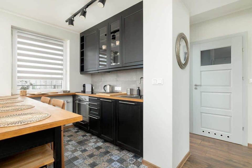 Kitchen with high-quality appliances that provide the opportunity to prepare home-cooked meals. 