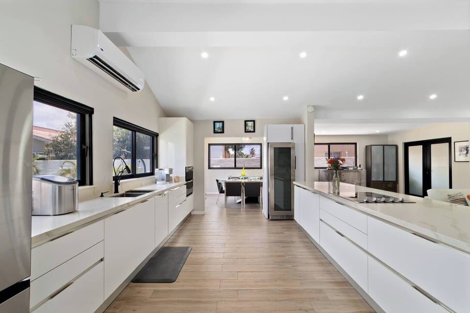 Modern culinary haven: Our kitchen is equipped for all your gourmet adventures