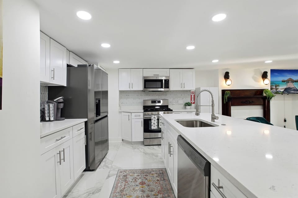 The kitchen is fully equipped with new appliances and all the utensils, pots and pans needed to whip up a meal