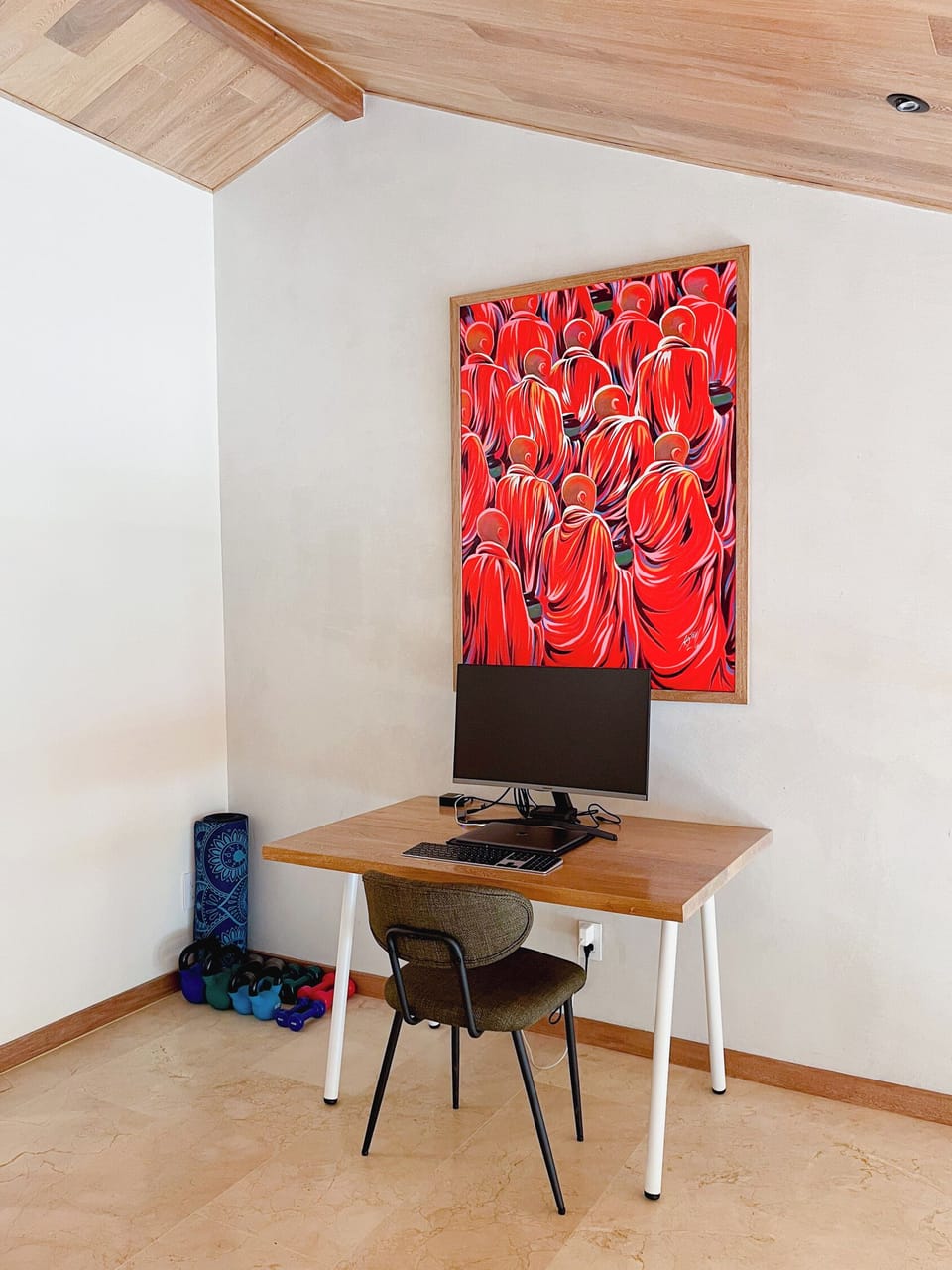 The second-story landing has a dedicated workspace with a large desk