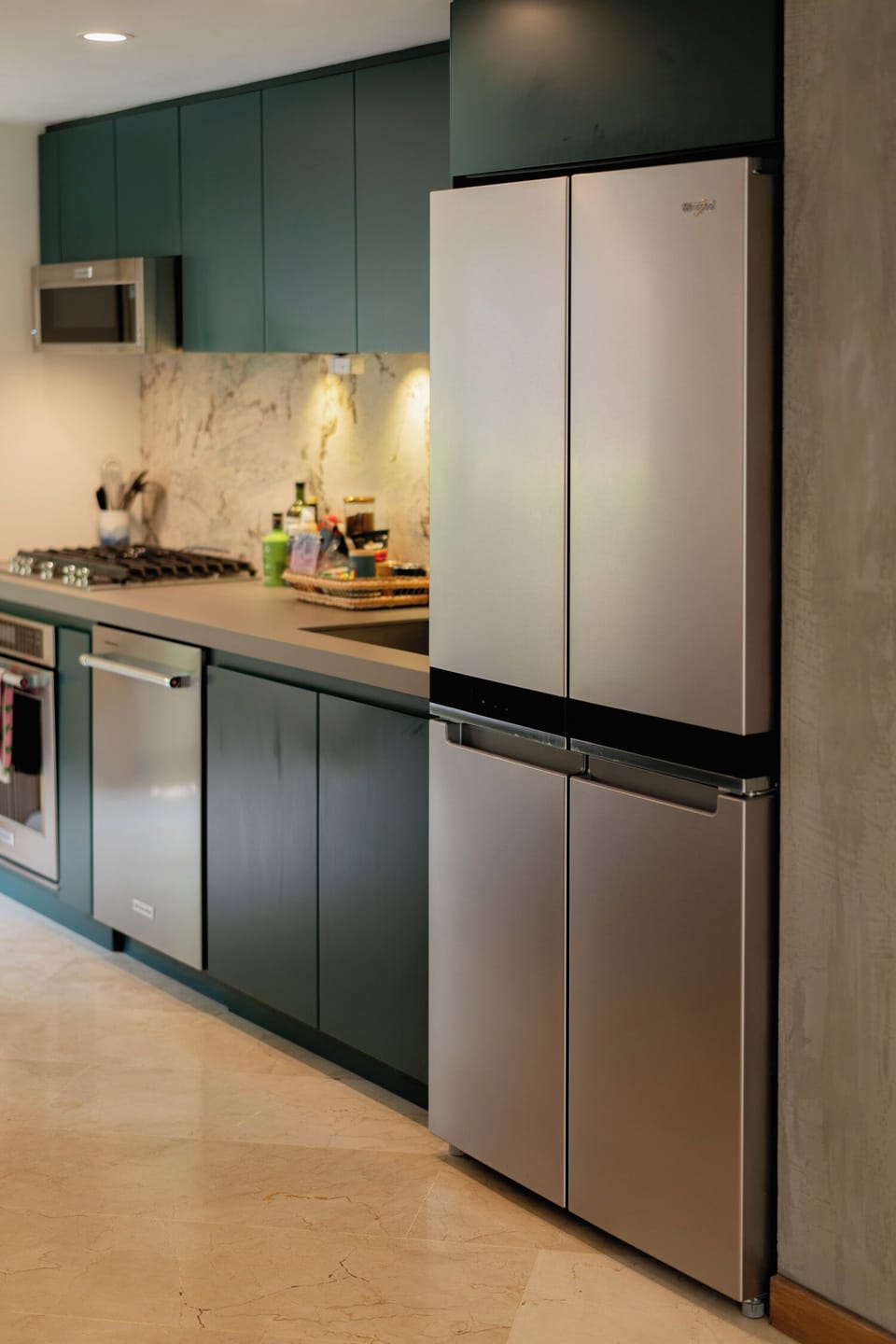 Top-of-the-line kitchen appliances, including a dishwasher and oven