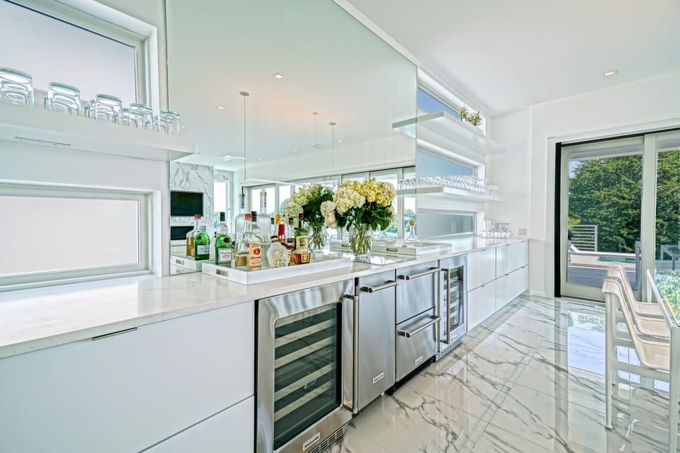 Serving Bar Including Ice Maker, Wine Coolers and Drawer Fridge, Storage