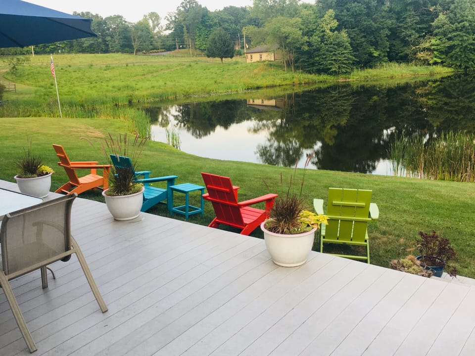 Wrap-around deck overlooking private pond