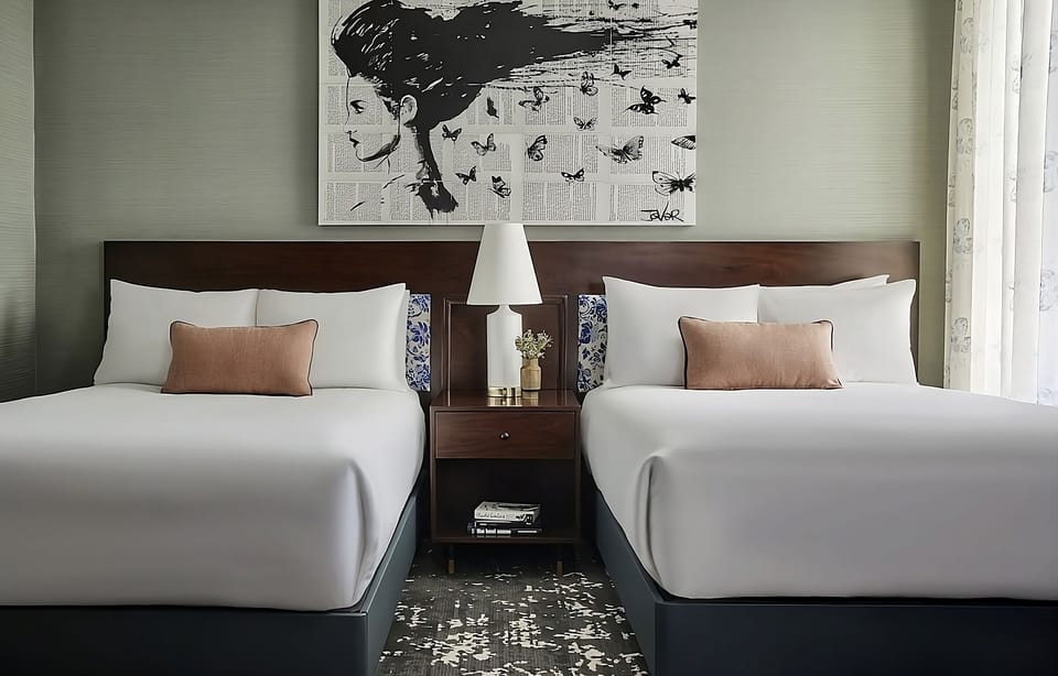 Drift off in serene comfort with balanced lighting and plush beds.