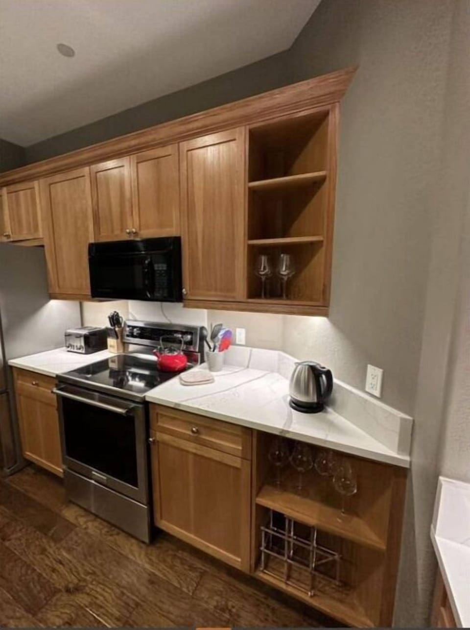 Utilize our compact kitchen, featuring modern amenities, ample storage, and a convenient layout. Perfect for preparing quick and easy meals.