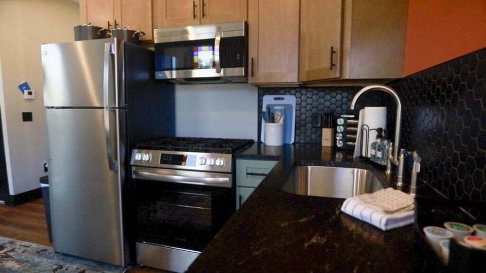Victorian unit E queen efficiency apt kitchen downtown muskegon