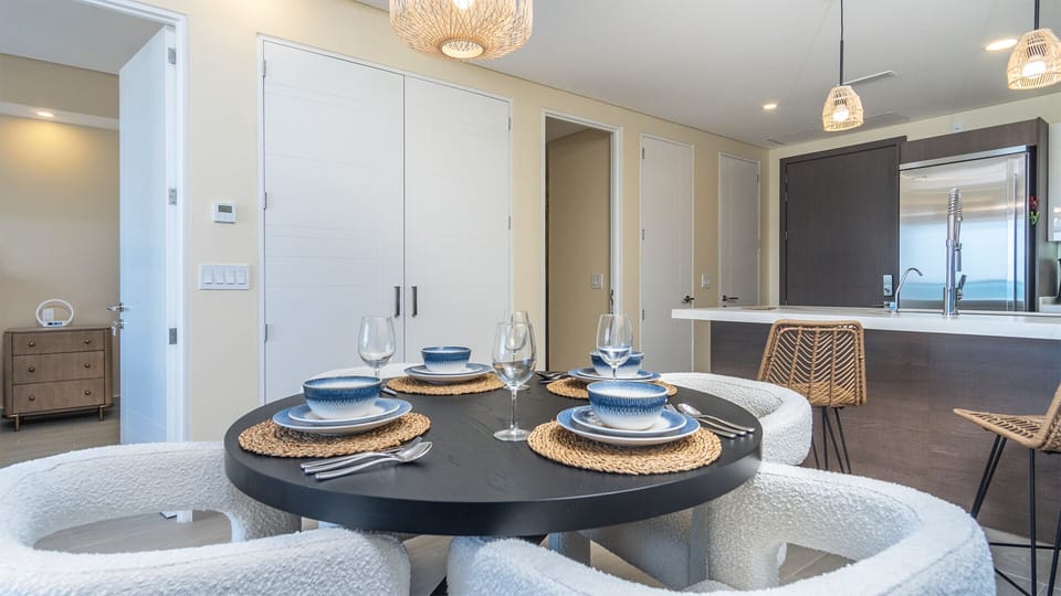 Four sit comfortably at the dining table