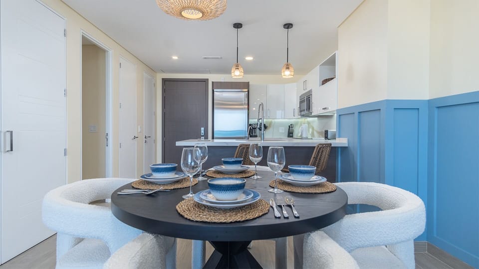 The dining table and the kitchen