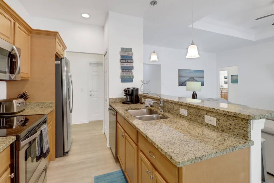 Cookware, dinnerware, many kitchen tools and small appliances are provided, including a Keurig coffee maker.