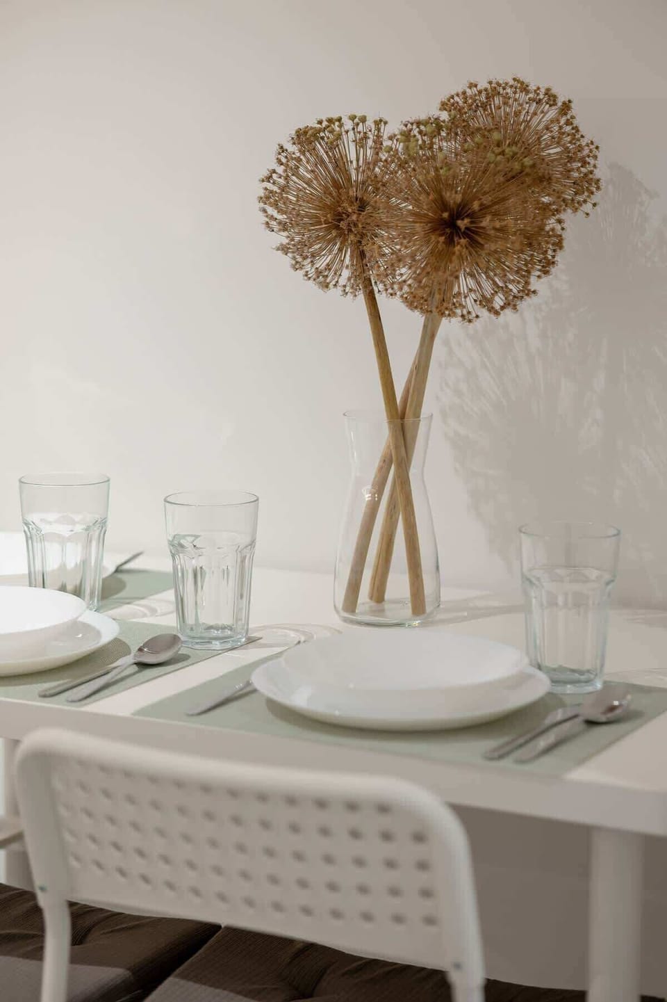 Dining table with tableware.