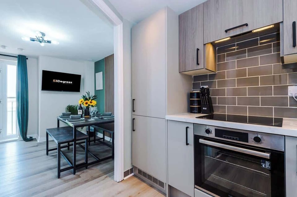The open-plan living room, dining area and kitchen benefit from a comfortable double sofa-bed, 40-inch SMART TV on a movable bracket & dining table that can comfortably seat 6.