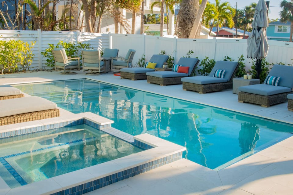 Newly renovated home! Unwind by our resort-style pool and hot tub while soaking in breathtaking sunset views.