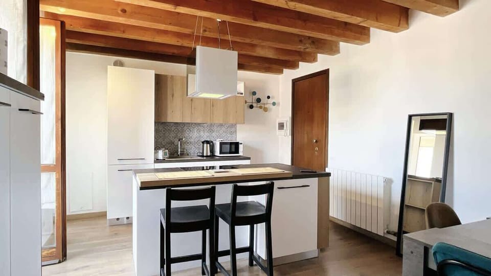 Modern and spacious kitchen with small balcony