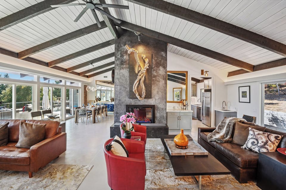 Open-concept great room combing living, entertainment, dining and kitchen  together effortlessly