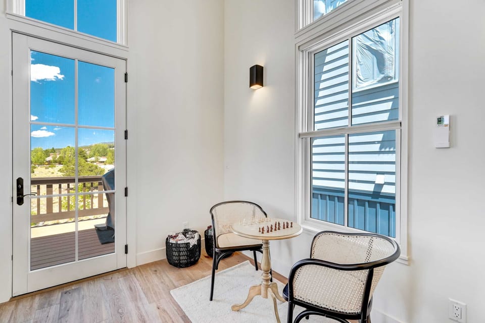 Cozy nook with seating, perfect for morning coffee or a quiet reading spot.