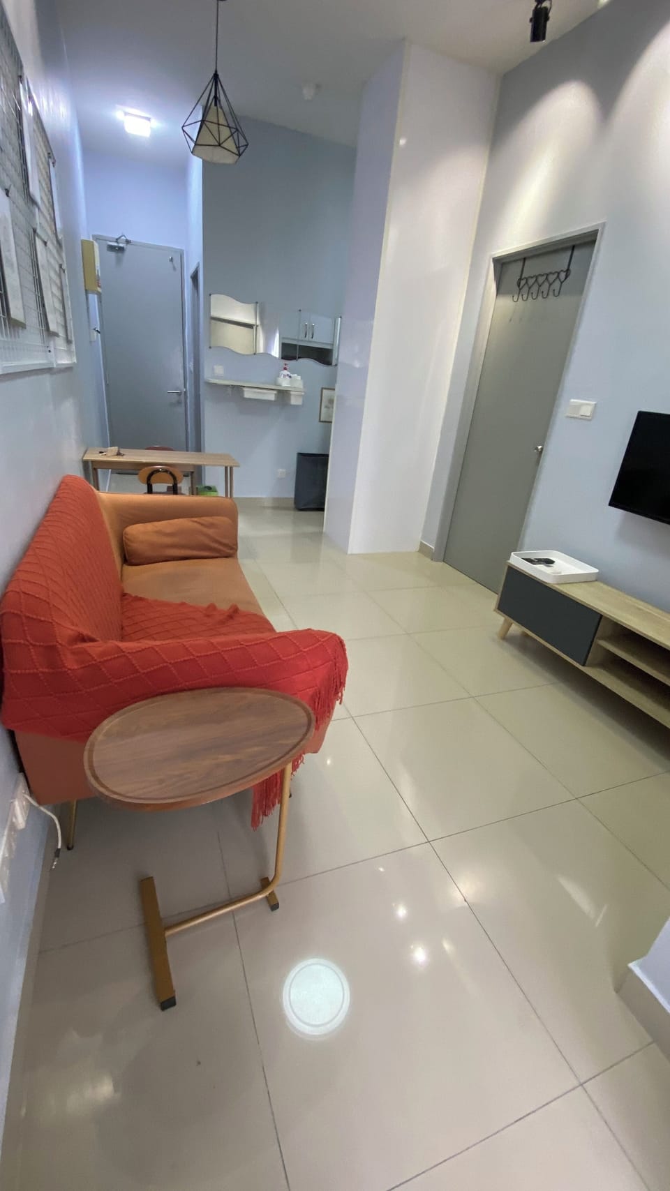 Living Area with Sofa and Television