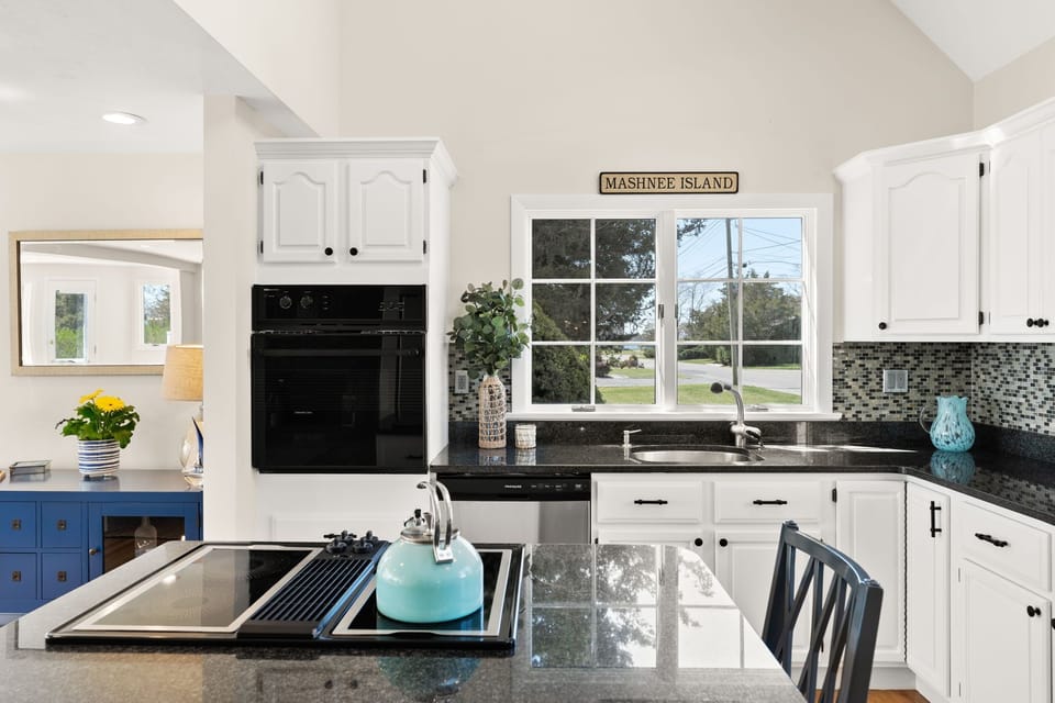 Well appointed kitchen with counter seating

