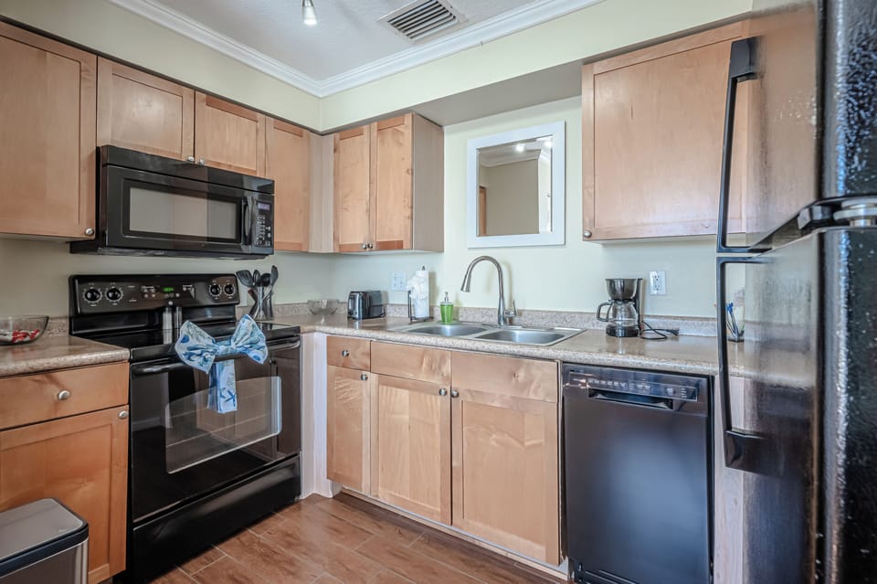 Well Equipped Kitchen with New Dishwasher and Refrigerator 