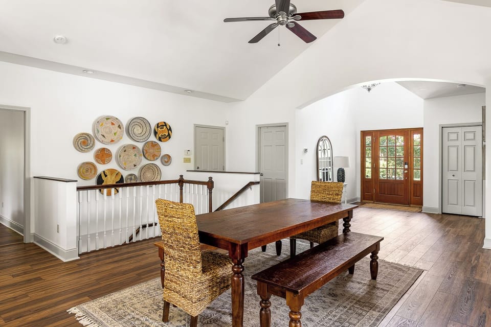 Dining table can seat 8 comfortably or 10 if you want to squeeze in.