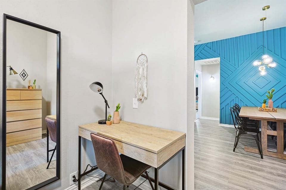 Looking for a quiet spot to wrap up some work or studying? This dedicated work station includes a desk, chair, and lamp to help you channel your productivity.