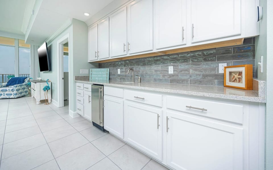 Grab a chilled drink from the fridge or create your favorite cocktail at the wet bar