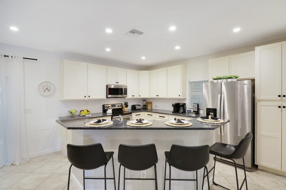 Island sink with counter seating for 4