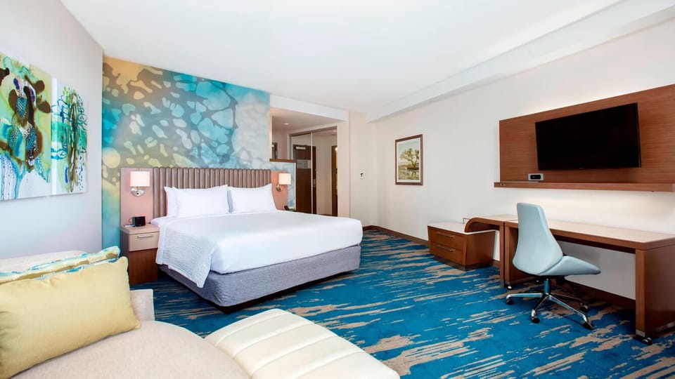 Unit with King bed. Exact unit will be assigned upon arrival. Views, colors, and decor may vary.